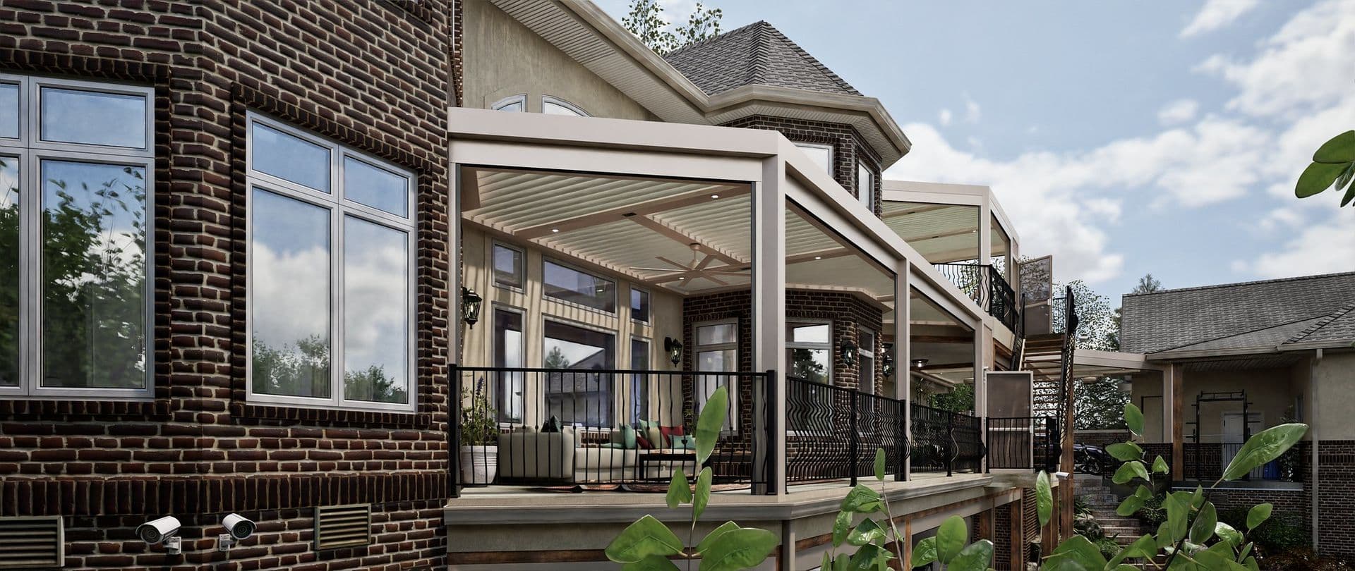 Spacious brick house with modern glass windows, featuring a large patio with a pergola and elegant seating area, surrounded by lush greenery.